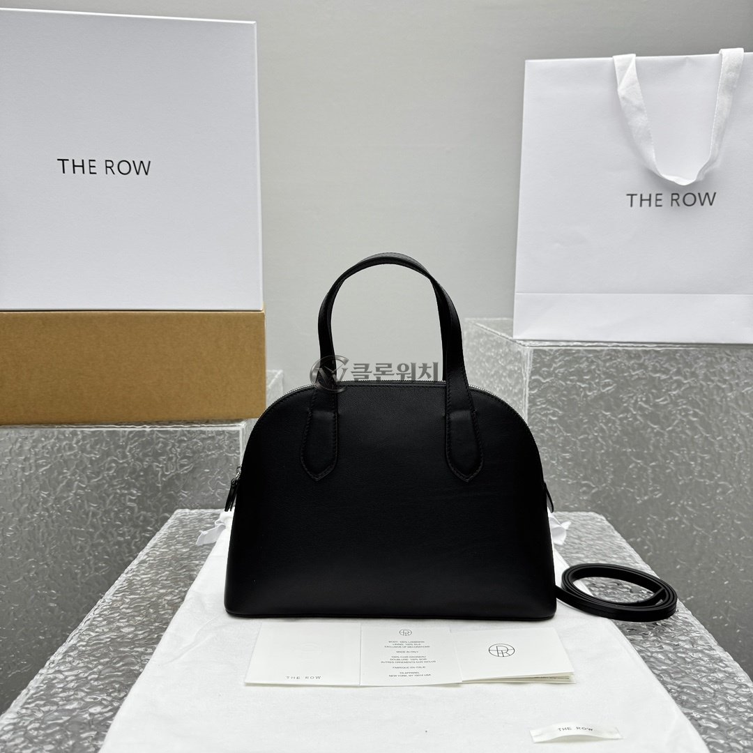 THE ROW Round 90’s Leather Top Handle Bag in Black