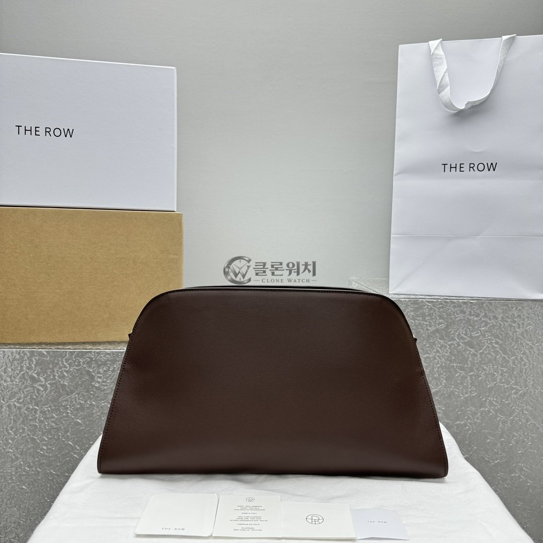 THE ROW Margaux E/W Leather Clutch in Brown