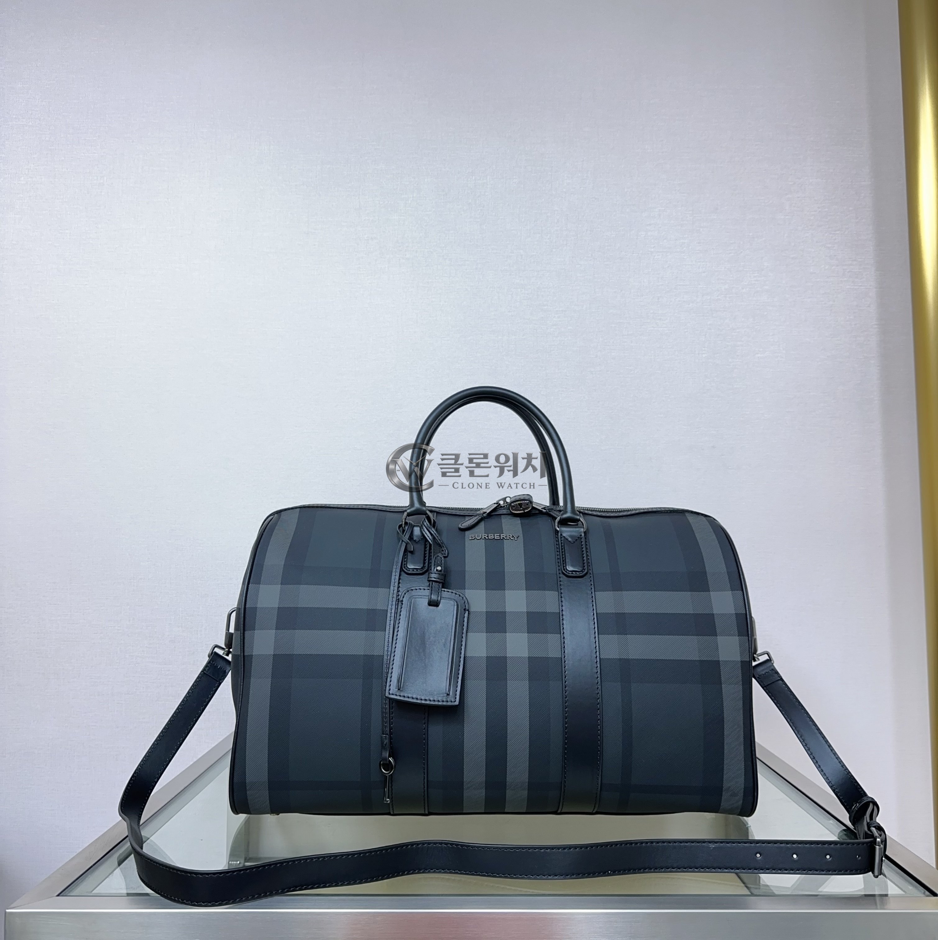 버버리 Burberry Check leather-trimmed duffel bag in charcoal grey