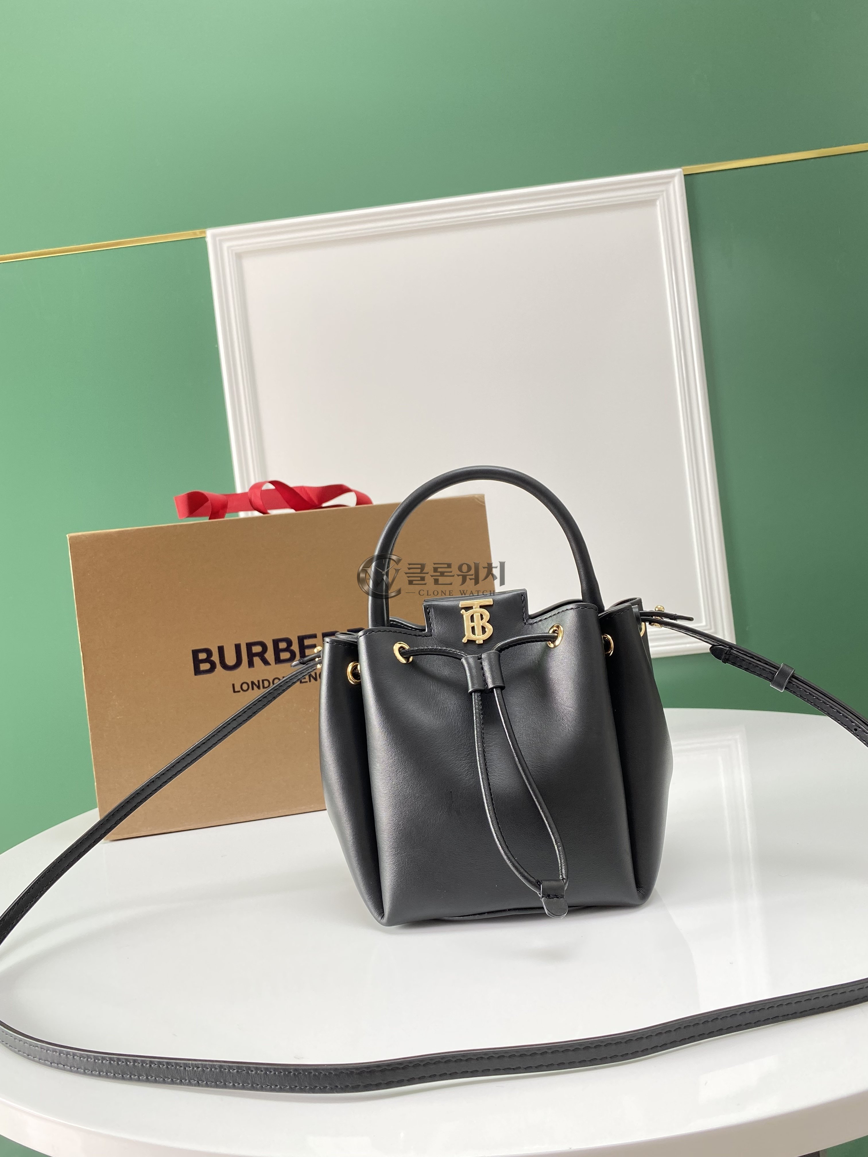 버버리 Burberry Mini TB Monogram Drawstring Bucket Bag in Black