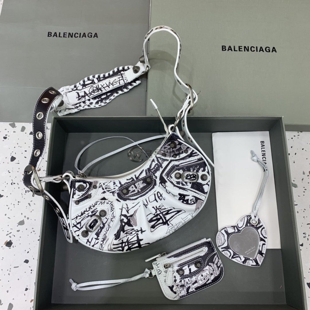 발렌시아가 Balenciaga Le Cagole XS Shoulder Bag in White/Black Graffiti
