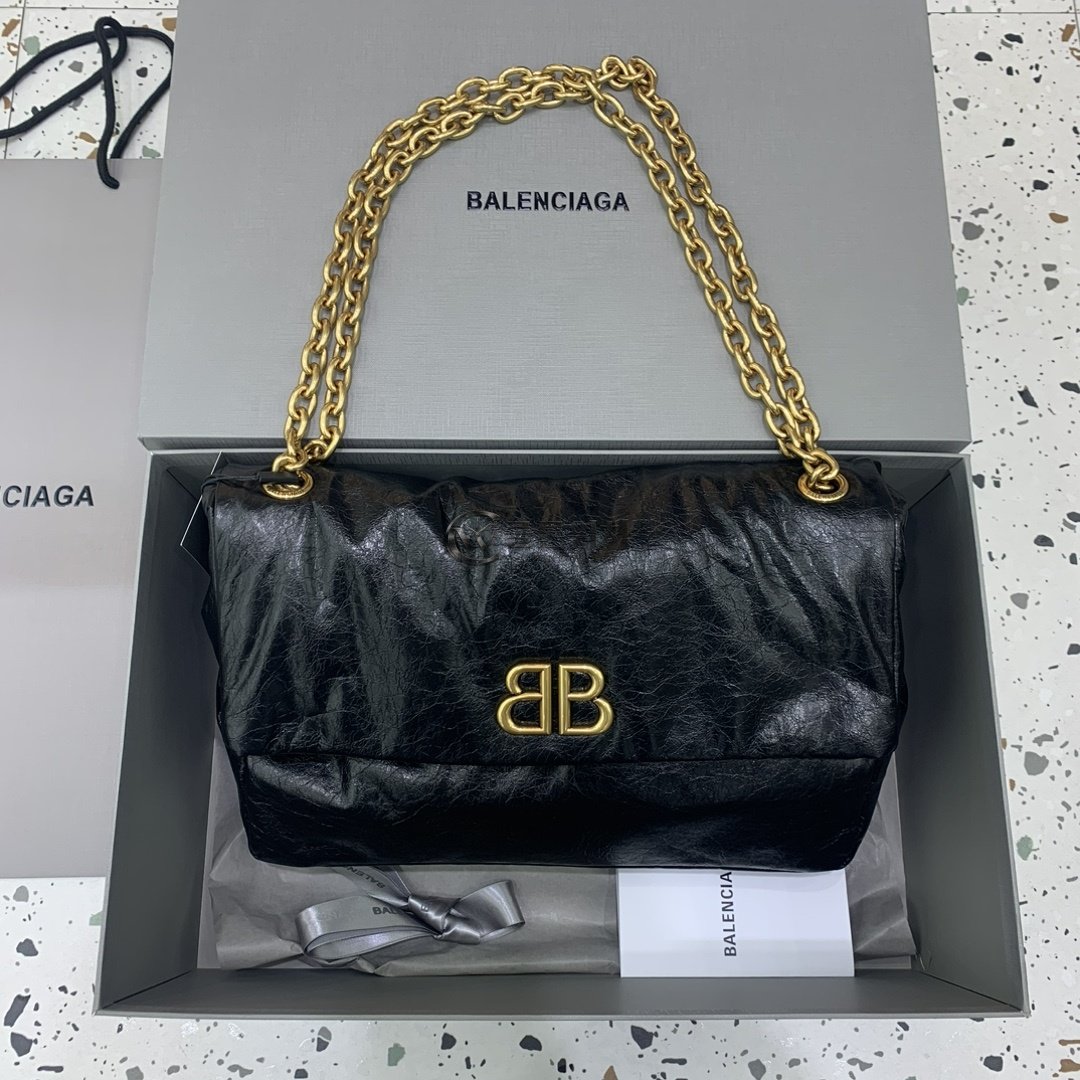 발렌시아가 Balenciaga Crush Medium Chain Bag in Black