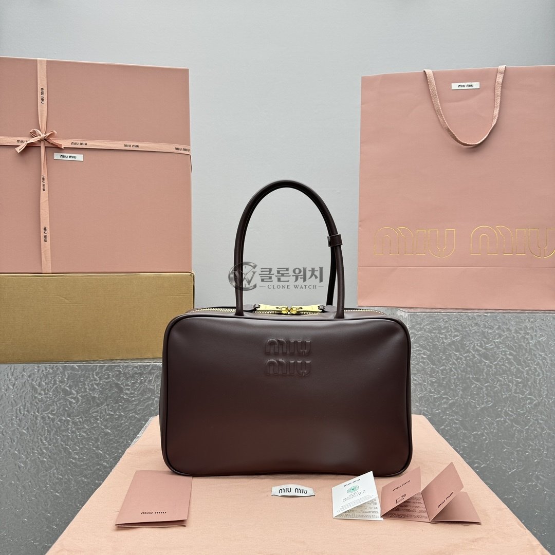 MIU MIU Aventure Leather Top-Handle Bag in Dark Brown